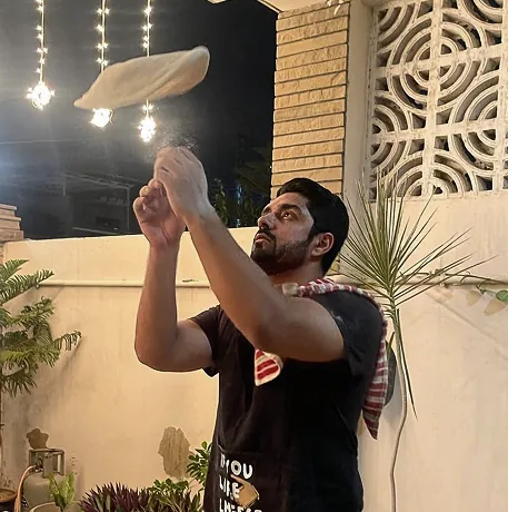 Babar at the brick pizza oven